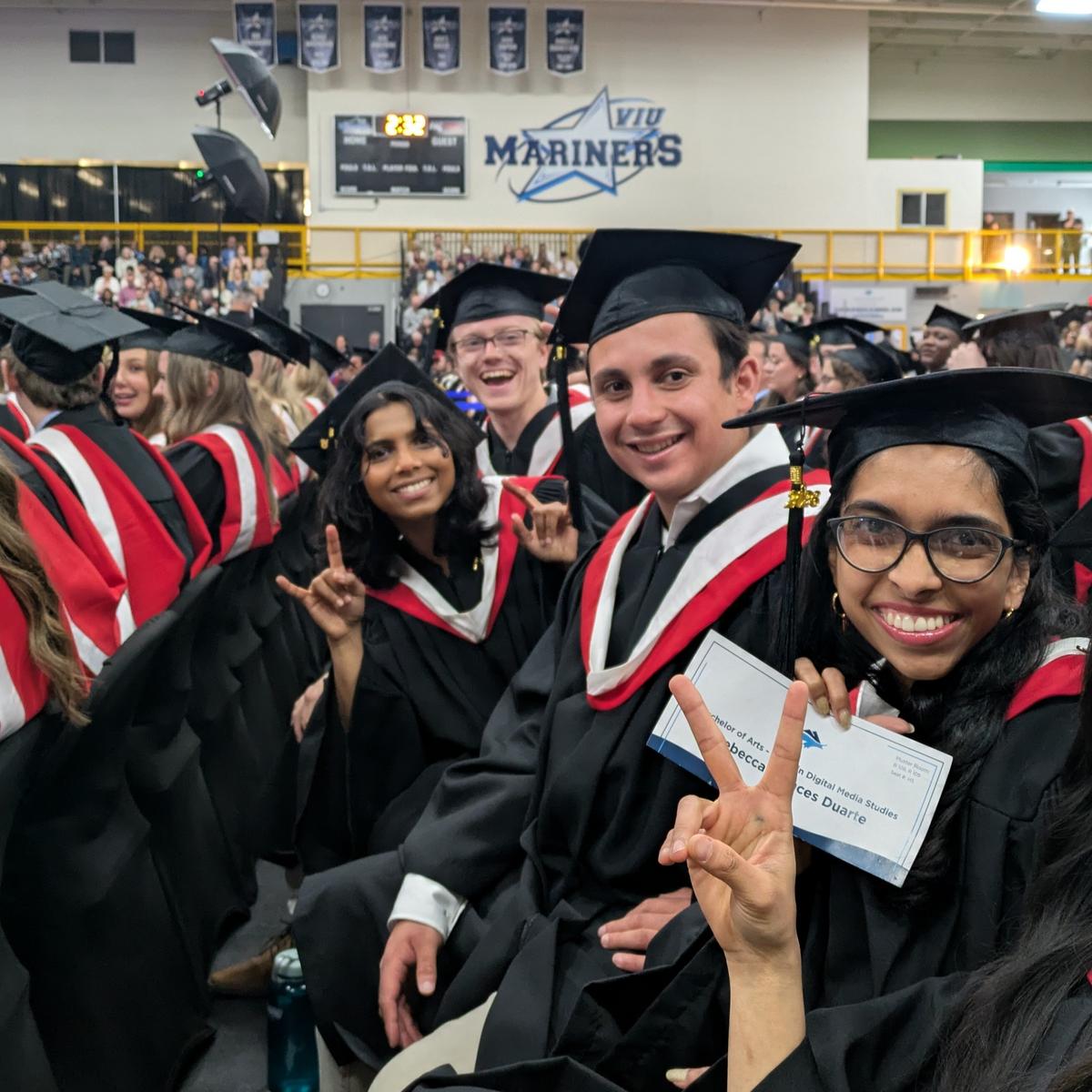 Rebecca-Duarte-graduating-with-her-friends