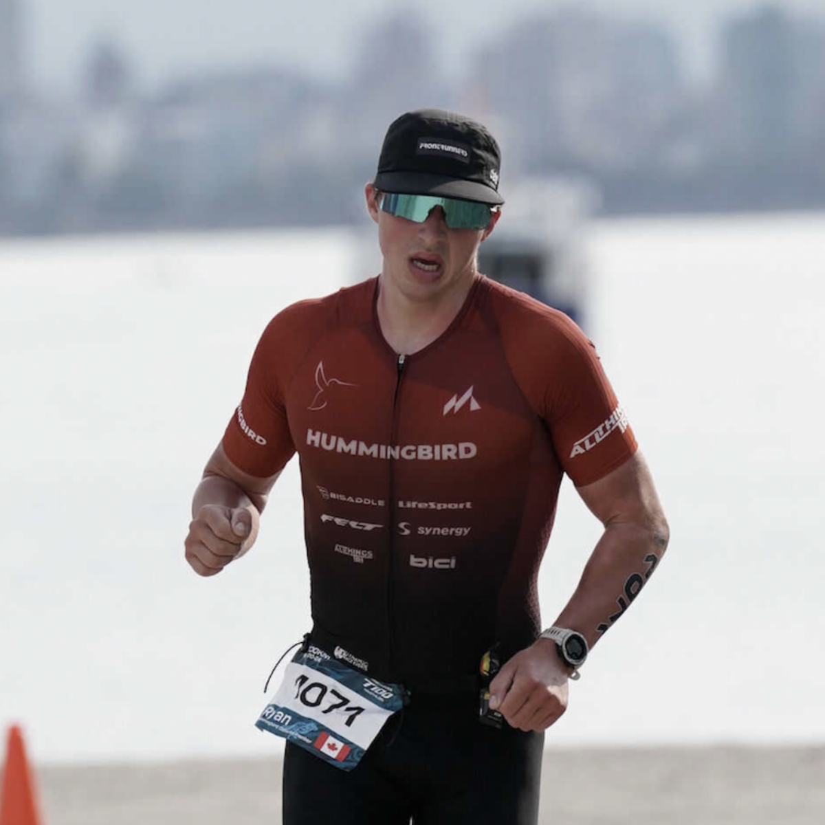 Ryan Seamn running outside during a triathlon.