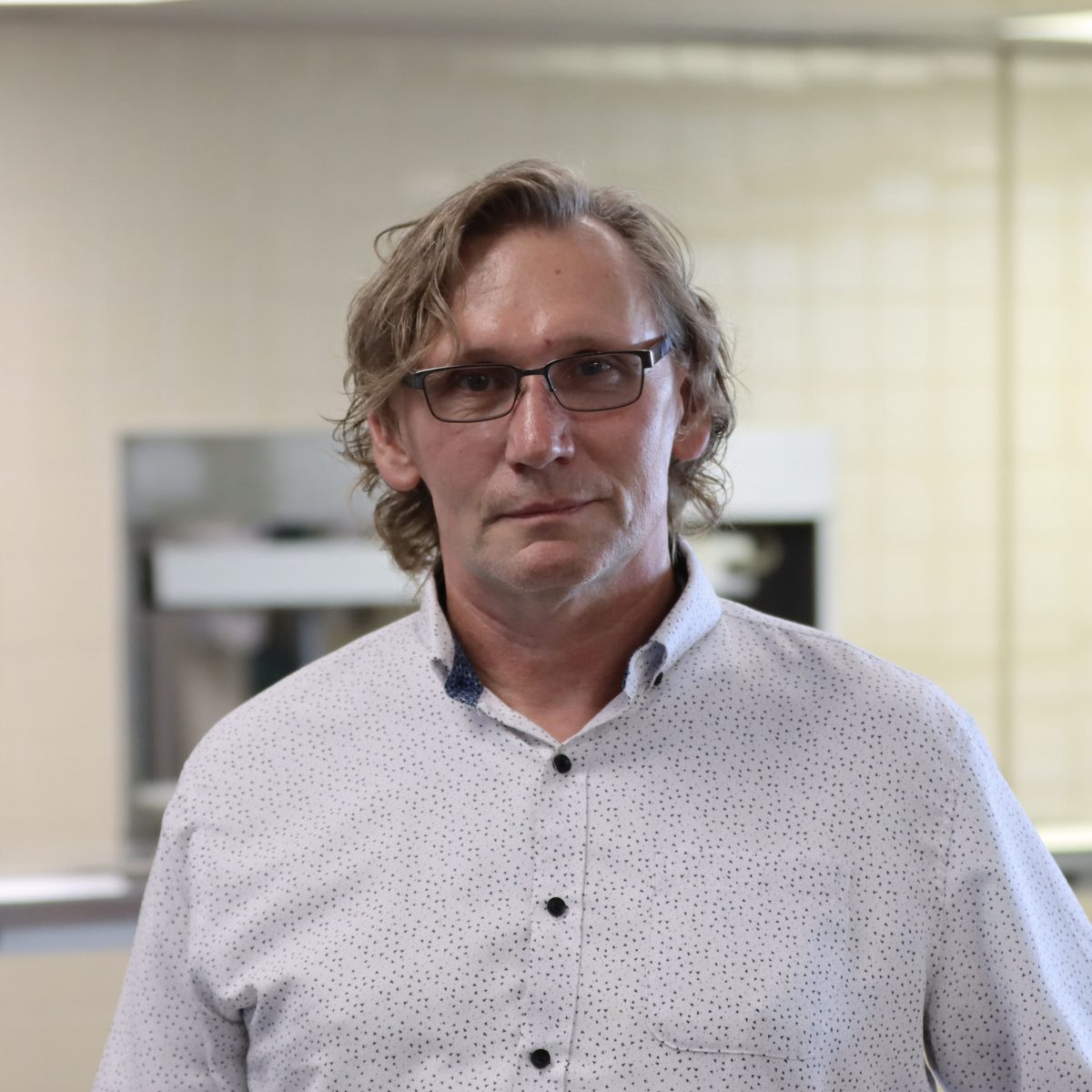 Tim May looking at the camera
