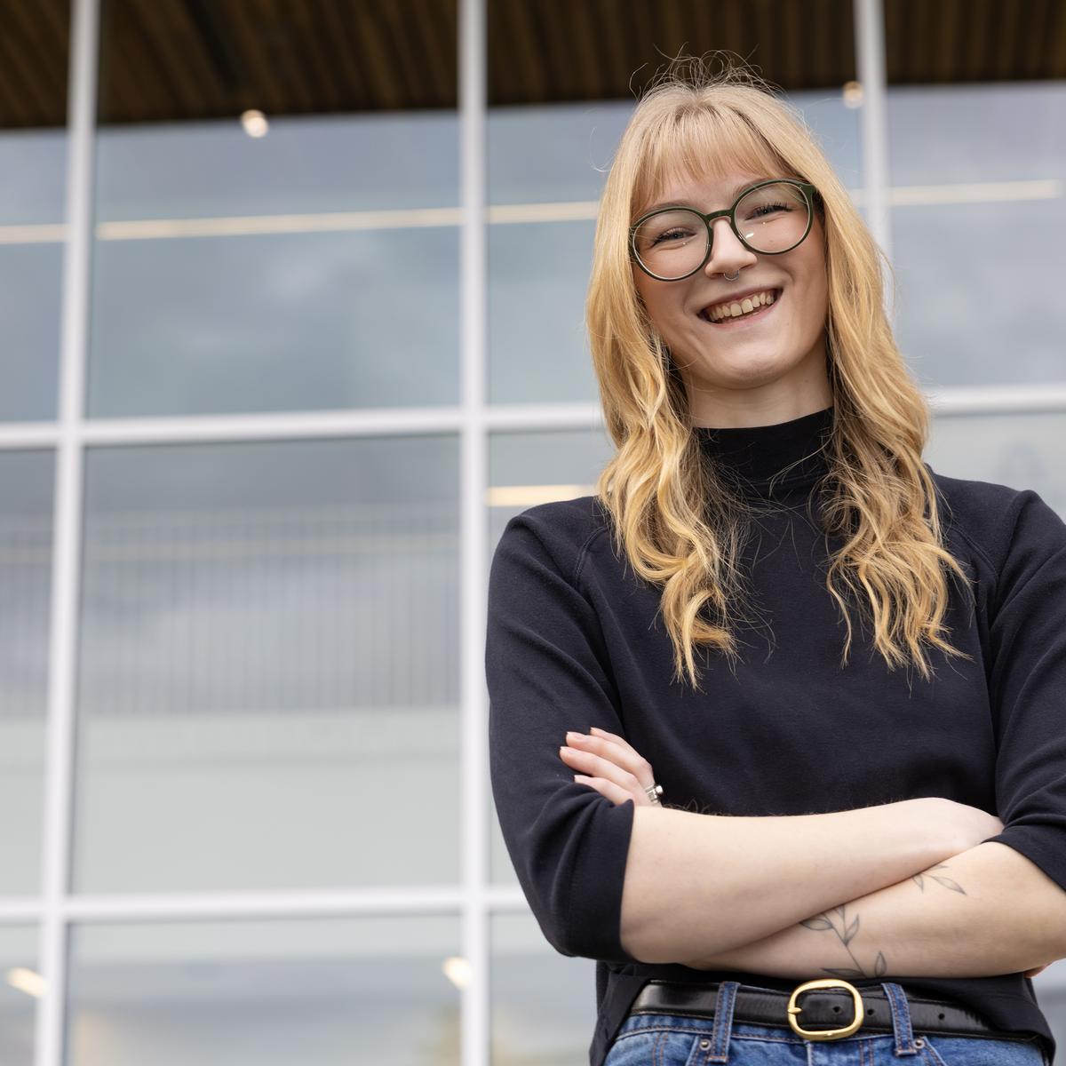 Casey in front of the Centre for Health and Science