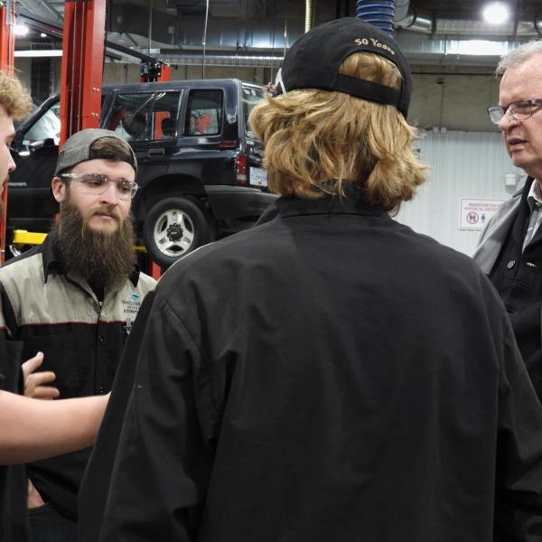 Minister Ralston talks with students