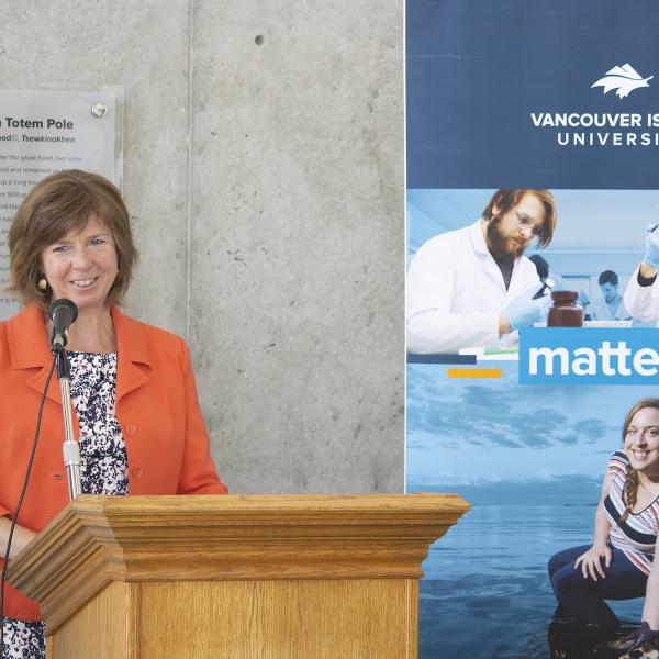 Sheila Malcolmson, Minister of Mental Health and Addictions, speaks at a podium.