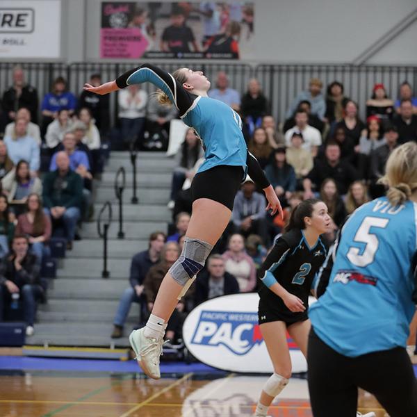 Aimee leaps for the ball