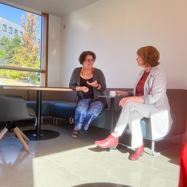 Sheila Malcolmson, MLA for Nanaimo, and Lillian Morton tour the Shq’apthut Elder lounge