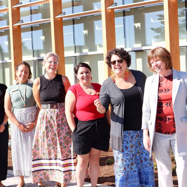 Sheila Malcolmson, MLA for Nanaimo and staff pose outside of Shq’apthut