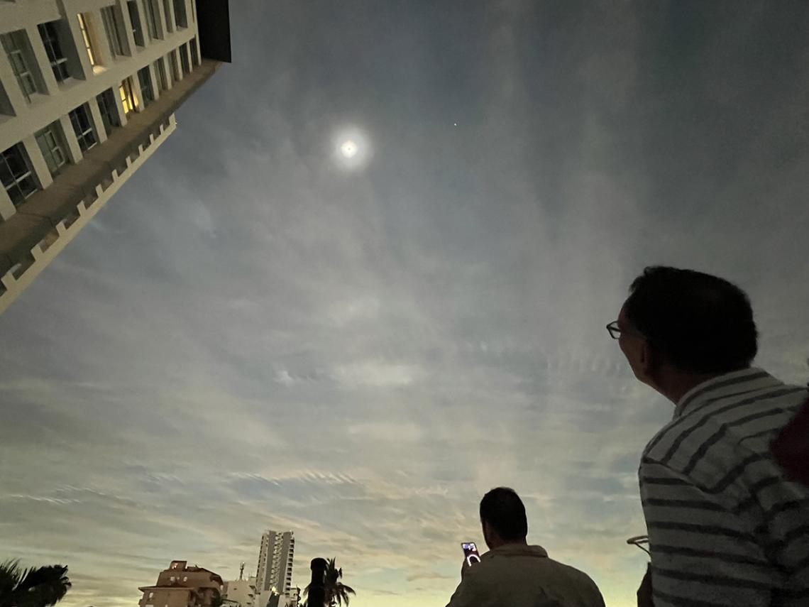 People gazing up at the eclipse during totality