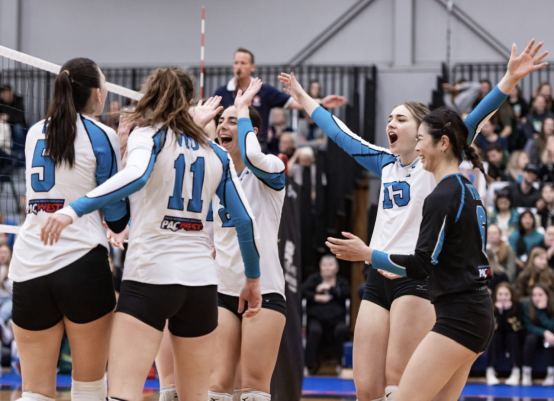 members of the VIU Mariners women's volleyball celebrate after a point