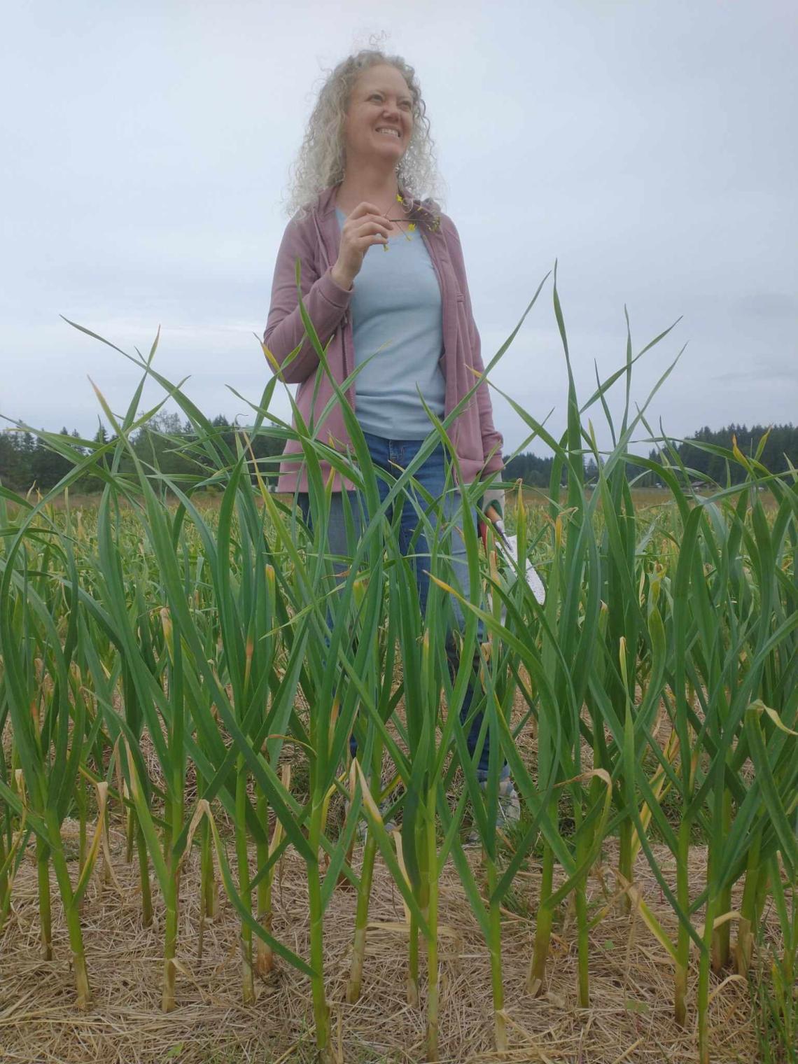 Toni in her garlic field