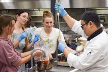 Culinary arts and microbiology students in the lab