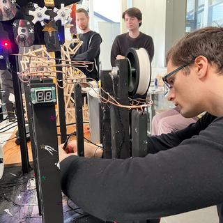 Engineering students adjust their designs