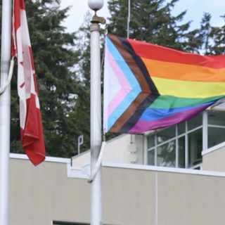 The Pride flag flies in Royal Bank Plaza at VIU's Nanaimo campus