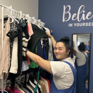 Kirsten peruses the racks in the Career Closet