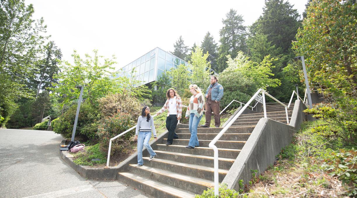 students walking down a set of stairs outside