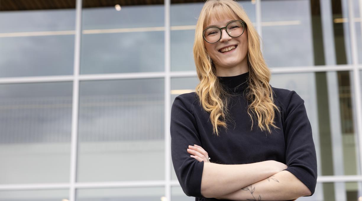 Casey in front of the Centre for Health and Science