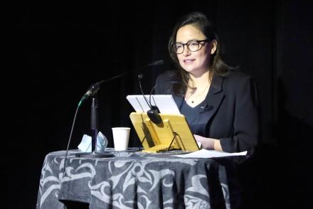 Indigenous Speakers Series keynote Connie Walker speaks at a podium in the Malaspina Theatre