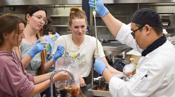 Culinary arts and microbiology students in the lab
