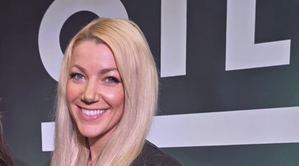 Caitlin Hartigan smiling at the camera