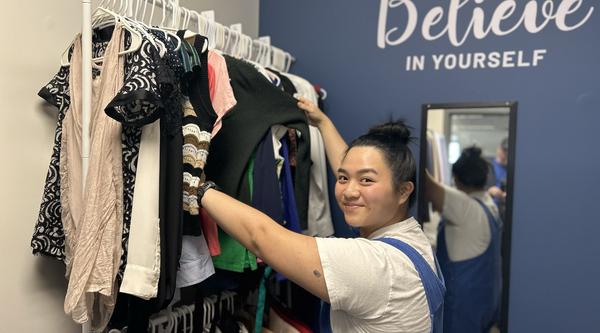 Kirsten peruses the racks in the Career Closet
