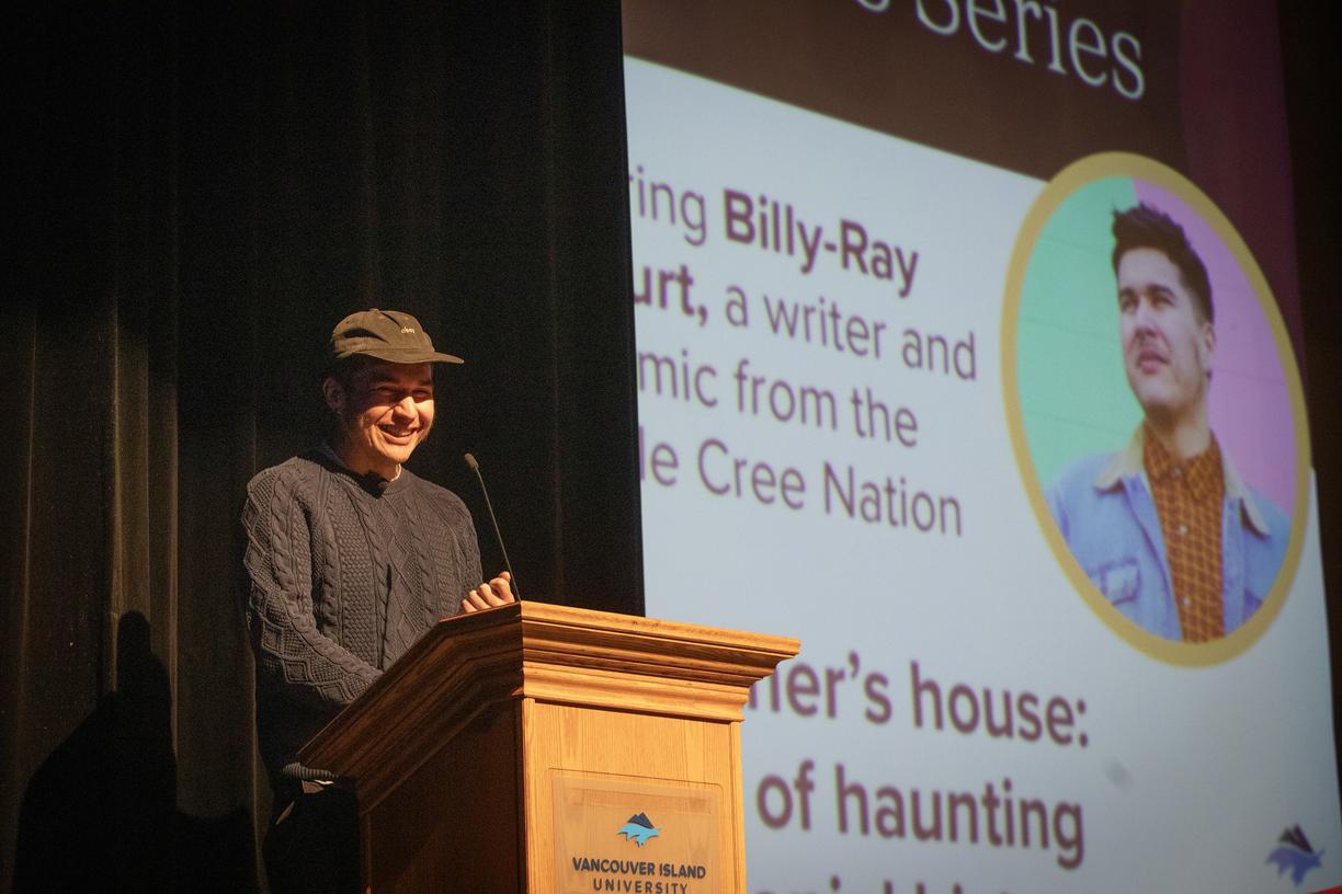 Billy-Ray Belcourt speaks at the VIU podium