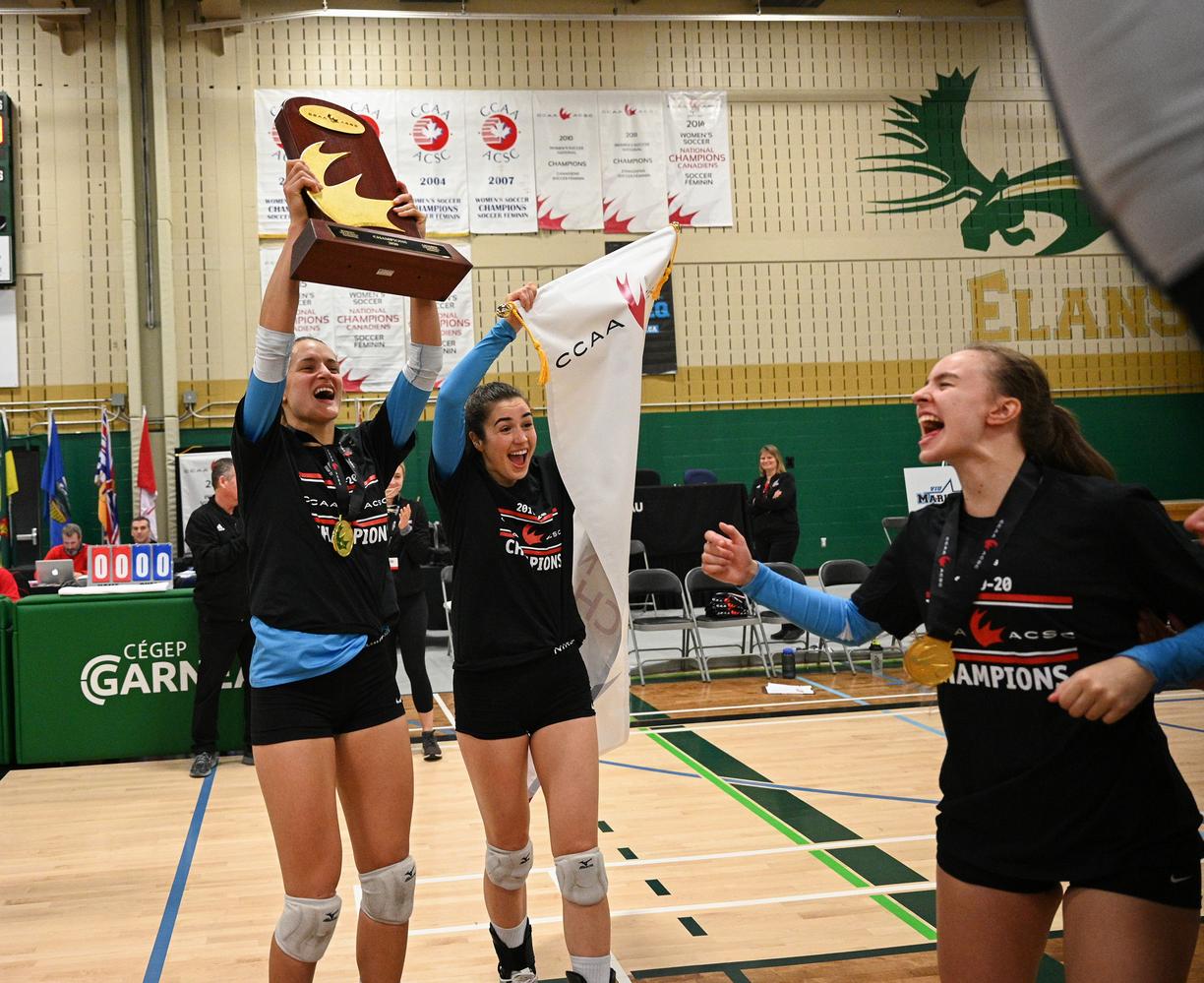 Andrea celebrates a victory with her teammates