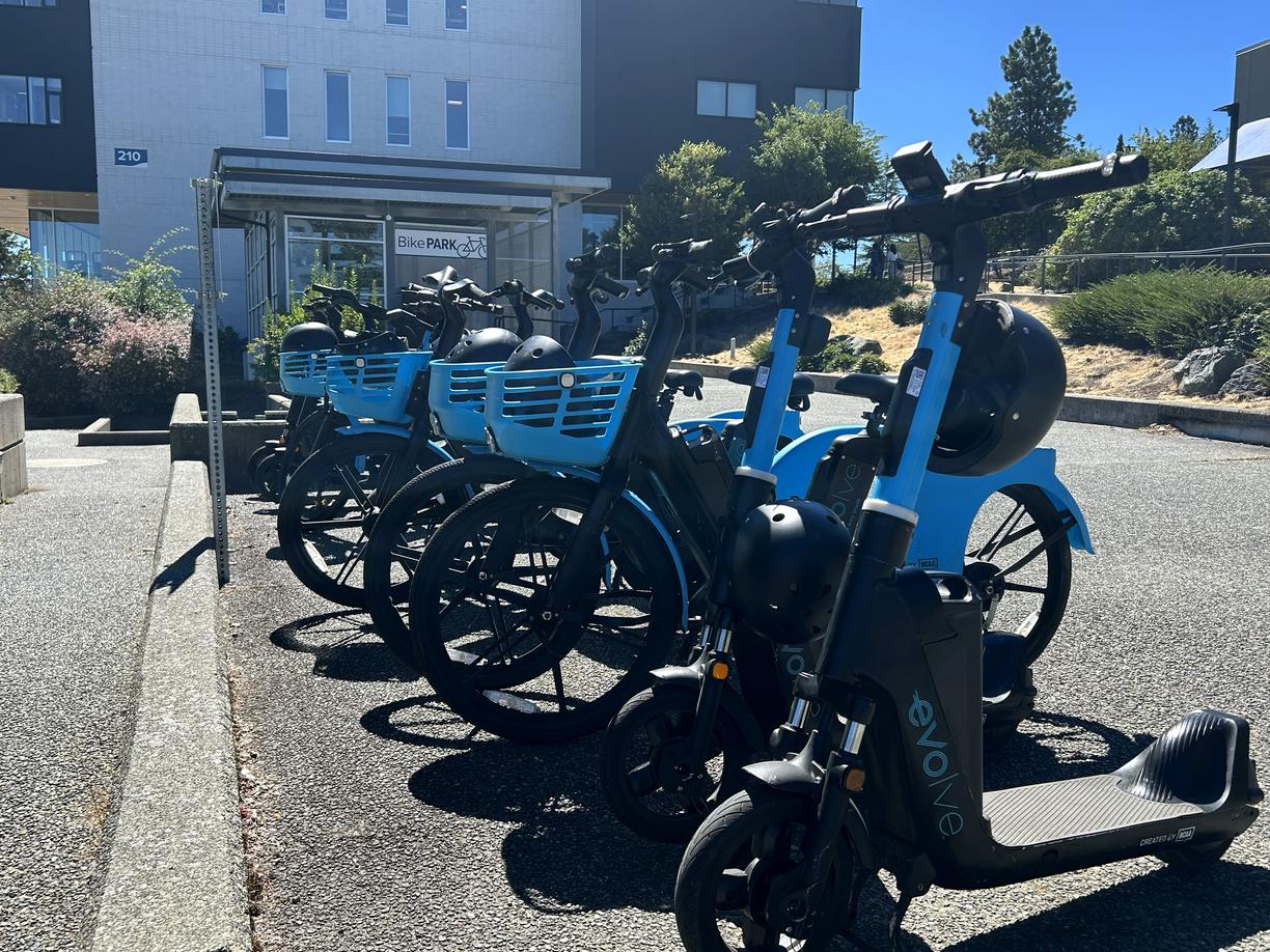 A row of electric bikes parked at VIU's Nanaimo campus