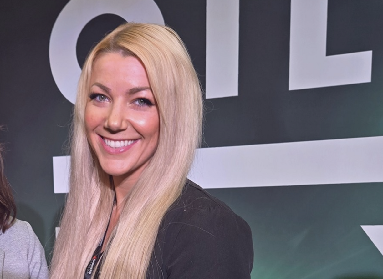 Caitlin Hartigan smiling at the camera