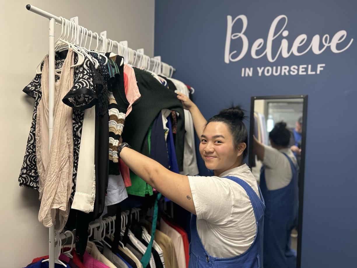 Kirsten peruses the racks in the Career Closet