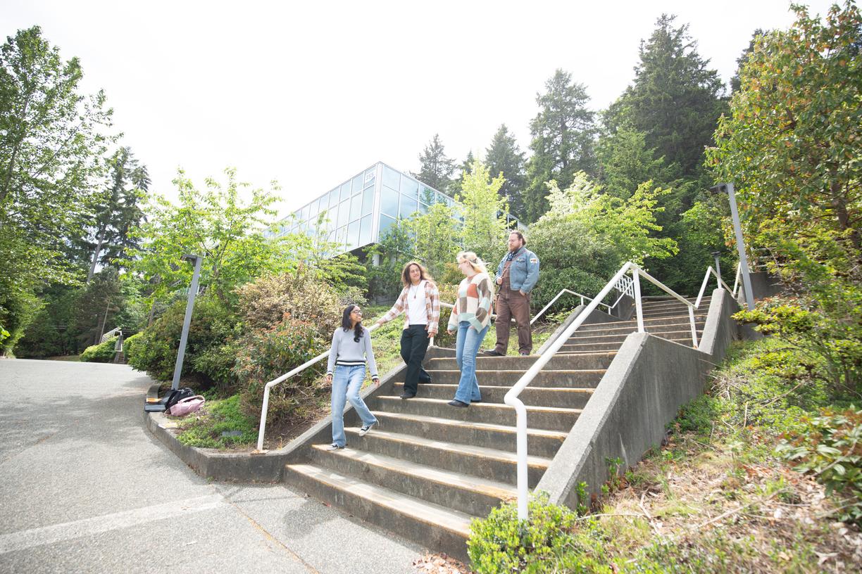 students walking down a set of stairs outside