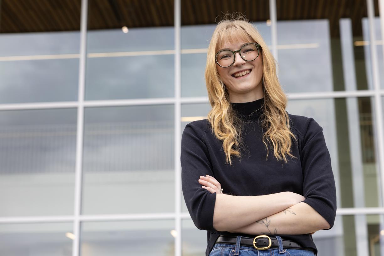 Casey in front of the Centre for Health and Science