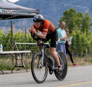 Ryan on a road bike during a triathlon.