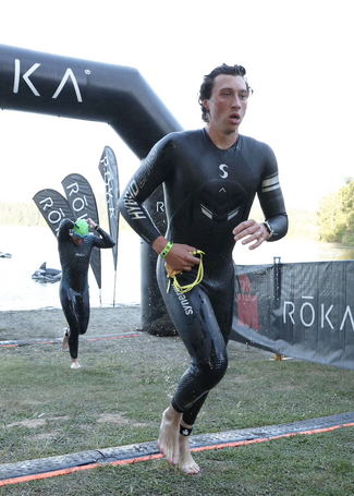 Ryan leaving the water after the swim portion of a triathlon.