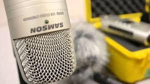 an up-close photo of a grey microphone