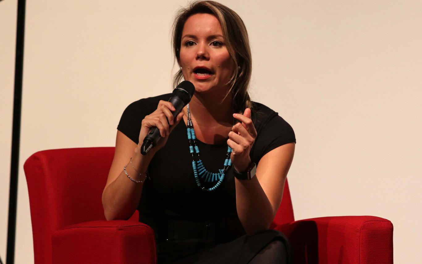 Woman holding a microphone