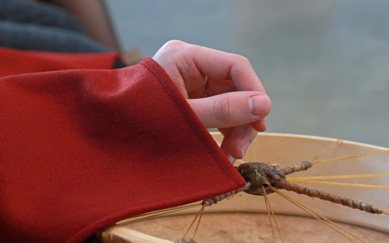 Hand holding a drum
