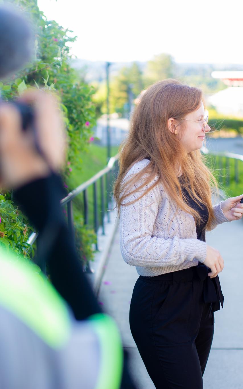 Jay interviews another student and is filmed by a third student